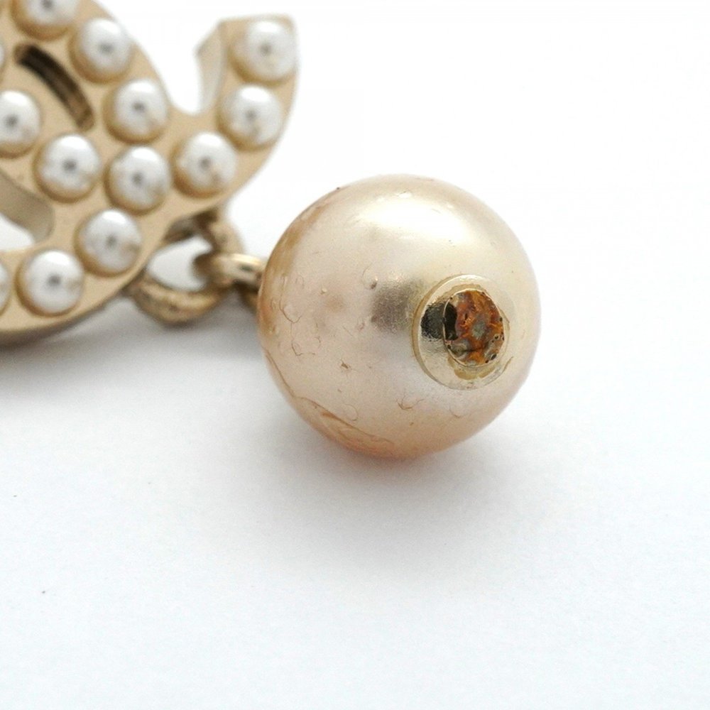 CHANEL Gold Pearl Logo Earrings - Picture 8 of 8